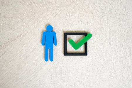 Man and green check mark. Recruitment success, performance recognition, or personal achievement. HR processes, job approvals, or professional certification.の写真素材