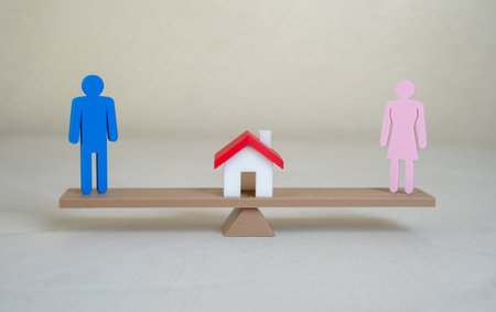 Distribution of household duties. Division of property in case of divorce. Divorce proceedings, co-living arrangements, or gender roles in the household.の写真素材