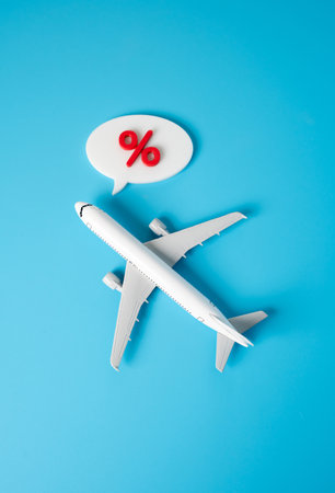 The plane speaks of high interest rates. High taxes, airport fees. Useful for content on aviation economics or regulatory impact.の写真素材