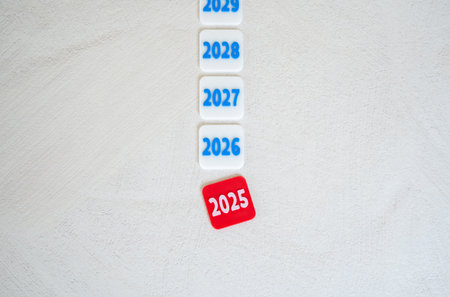 End of 2025 and transition to the next season. Business and sports. Transition planning, strategic foresight, and goal setting. Annual reviews, economic outlooks, changes in business environments.の写真素材