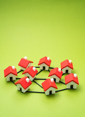 Houses connected by lines form a community. Unity and organization. Homeowners associations, or smart city connectivity through IoT and communal services.の写真素材
