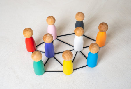 Multicolored figures of people are connected by lines. Multiculturalism, cooperation. Cultures and nations work together. Connection between countries. Diversity, international teamworkの写真素材