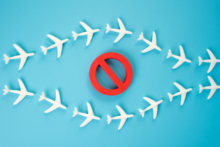 Passenger planes fly around the restricted area. Circumventing flight restrictions and embargoes. Violating sanctions. Geopolitical conflict, no-fly zones, economic sanctions. Risks in global aviationの写真素材