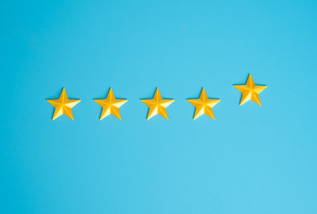 Adding a fifth star. Highest rating. Excellence, premium status, or service upgrades. Hotel rankings, product reviews, customer feedback, or quality certification.の写真素材