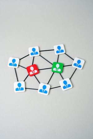 Conflict in the corporate environment and ways to resolve it. Two poles in the team of a business company. Workplace polarization. Leadership challenges, communication breakdowns.の写真素材