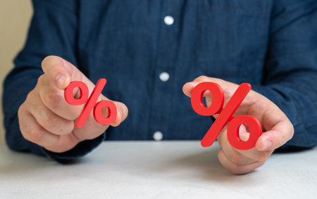 Comparison of two interest rates. Deposits, loans, leasing and mortgages. Rate fluctuation. Interest-sensitive sectors. Consumer behavior under different financial product conditions.の写真素材