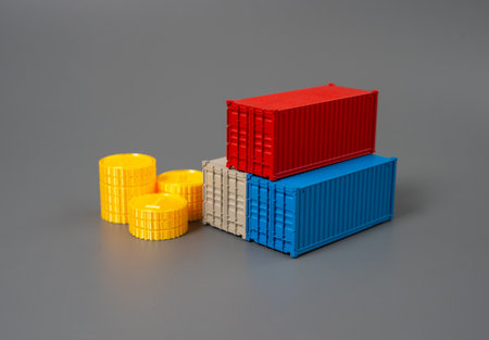 Commercial sea containers and a stack of coins. Trade and commodity circulation. Global trade flows,...