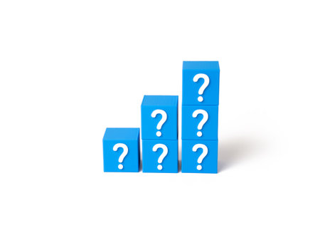 Blocks with a question mark in the shape of a ladder. Start solving the mystery with something smaller. Step by step solution. Clarity through stages. Structured thinking process.の写真素材
