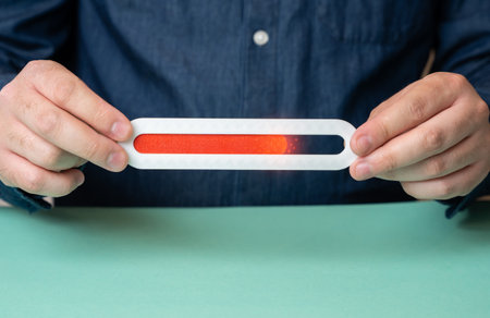 A man holds a progress bar filled to 75 percent. Work on the home stretch. Timeline almost full,...