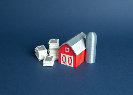 Farm and bureaucracy. Financial responsibilities and business responsibility. Strong regulation of agriculture affects farmers and rural economyの写真素材