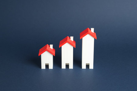 Homes in ascending order of the growth chart. Rising house prices. Growing rates of new construction, housing demand and real estate boomの写真素材