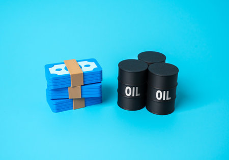 Money and oil barrels. Payment for energy resources, crude oil trade, export revenue, oil sales profit, fuel market, energy business, global commodity transactionsの写真素材