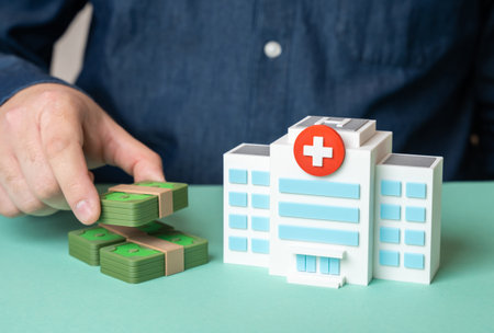 A man collects money for building a hospital, fundraising, charity healthcare, oncology support, social aid, medical progressの写真素材