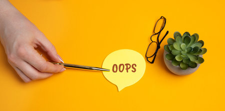 Sticky note with OOPS. Human error, mistake at work, forgotten tasks, apology, or accidental action....