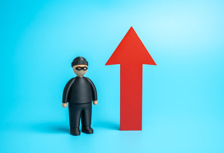 A robber and an upward arrow. Crime is on the rise. The crime situation is getting worse. Social...