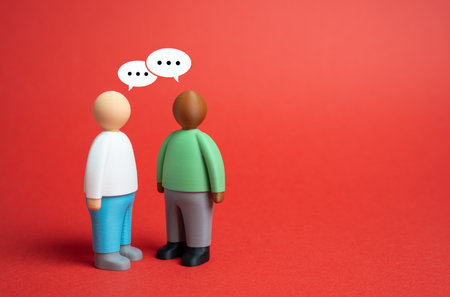 Two people engage in dialogue with each other. Communication and exchange of opinions. Finding friends and common interests. Integration into society. Social communication. Psychology, teamworkの写真素材