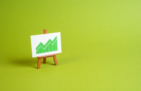 Growth chart on an easel. Profit and business performance improvement. Financial success, investment analytics, and entrepreneurship concepts in business presentations.の写真素材