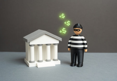 Fraudsters defraud banks. Money laundering. Offshore companies and financial schemes. Tax evasion. Criminal money turnover. Crime, cybersecurity, risk management, and financial investigation themes.の写真素材