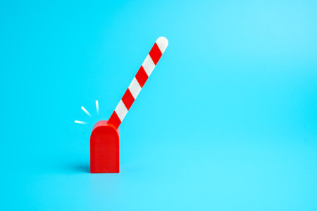 The barrier has opened for passage. The journey begins. A new road and opportunity. New beginnings. like Personal growth, trade liberalization, logistics, and goal achievementの写真素材