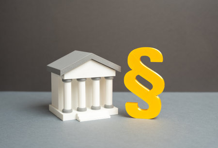 Bank building and paragraph symbol. Court and laws. Financial regulation, fiscal service. Financial control, taxation, government supervision. Finance regulation, economic policy, fiscal governance.の写真素材