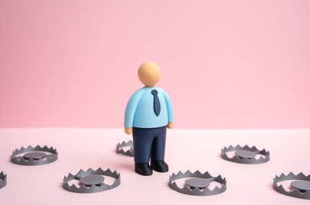 An office worker navigates a series of traps. An unfavorable contract. Harsh employment terms with fines and penalties. Exploitative labor conditions and workplace risks. Corporate ethicsの写真素材