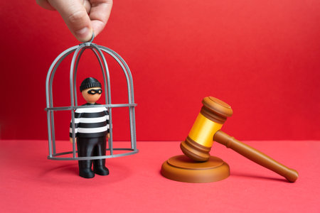 Placement of a criminal in custody. Arrest pending trial. Preventive measures and restriction of liberty. Depiction of justice, law enforcement, and accountability. Judicial systems, or prison reformsの写真素材