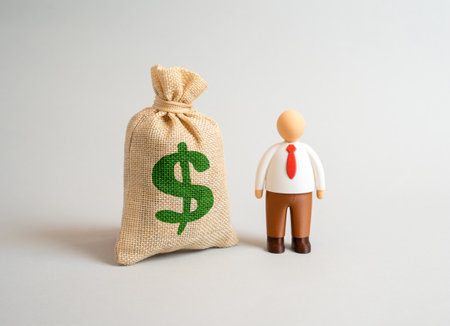Office worker and dollar money bag. Financial independence, wage growth, and the prosperity of working individuals. Savings and income stability. Expenses for employee retraining and training.の写真素材