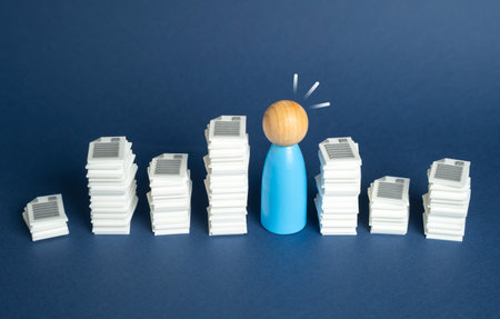 Bureaucratic barriers and time delays. A queue of papers and documents. Administrative pressure and workflow slowdown. Management, public services and office routines.の写真素材