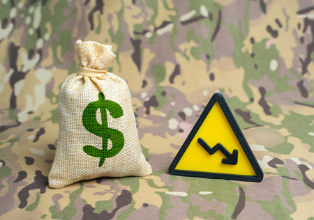 Reduction of the military budget. Cuts in defense spending and national security planning. Fiscal policy, geopolitical analysis, economic strategy and government reforms.の写真素材