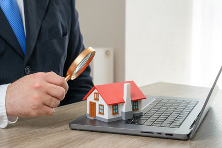 An appraiser evaluates a house. Find out the value of the house. Have the property verified by a lawyer. Real estate analytics, mortgage guidance and home buying decisions.の写真素材