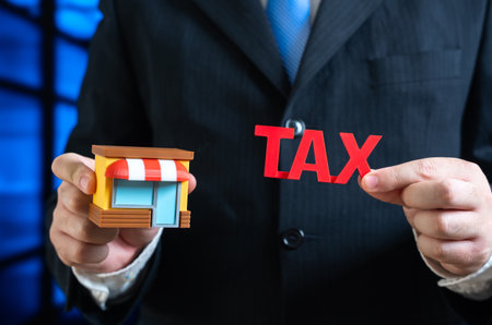 New taxes for small businesses. Entrepreneurship support , fiscal policy updates, regulatory changes and financial planning for SMEs.の写真素材