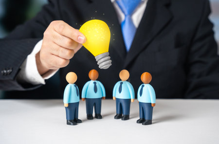 Share the idea with your subordinates and begin working on it. Suggest an idea and find a solution. Leadership initiative and team creativity. Brainstorming sessions and project development.の写真素材