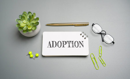 Adoption concept. Legal process through which a person or couple becomes the permanent, legal...