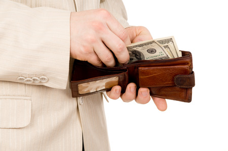 the man counted out the money wallet isolated on white backgroundの写真素材