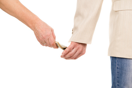 the man gently takes a bribe isolated on white backgroundの写真素材