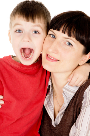 beautiful mother and her little son isolated on white backgroundの写真素材