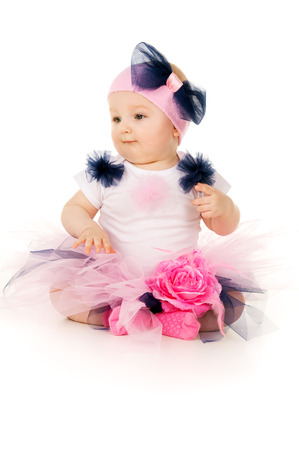 little girl sitting in a dressの写真素材