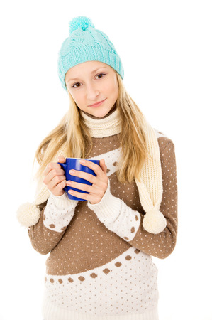 girl in a cap with a mugの写真素材