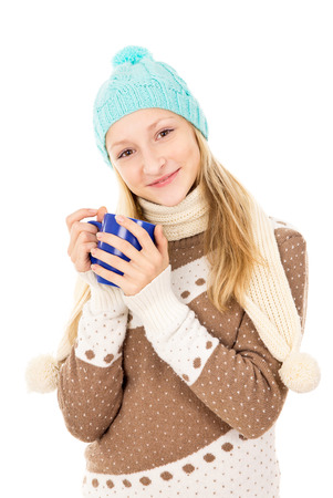 teen girl holding a cupの写真素材