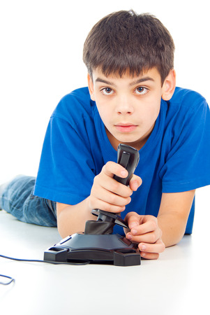 carefully guy plays video games on the joystickの写真素材
