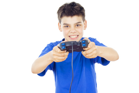 child plays on the joystickの写真素材