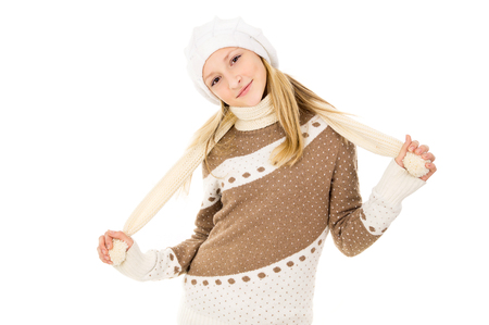 girl in a cap and scarf isolatedの写真素材