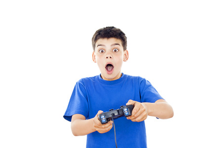 Boy playing on the joystickの写真素材