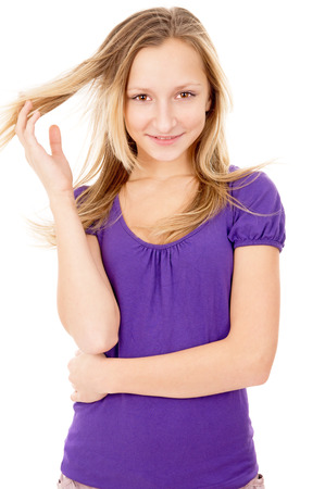happy girl poses standing isolated on white backgroundの写真素材