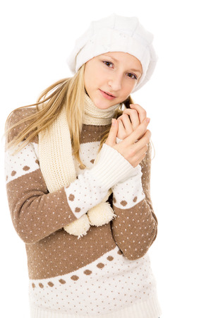 teen girl thought a hat and scarfの写真素材