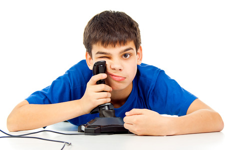 boy tired to play a video game joystick