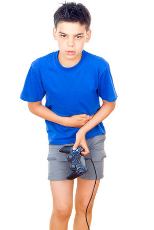 Teen plays with joystick isolated on white backgroundの写真素材