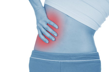 severe pain in the kidneys, shown red, keep handed, isolated on white backgroundの写真素材