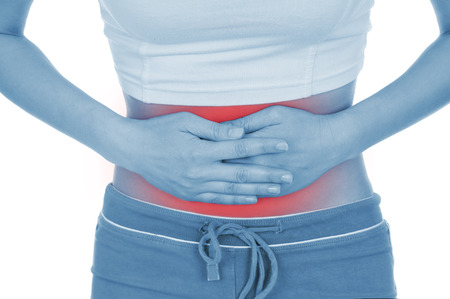 sore belly, shown red, keep handed, isolated on white backgroundの写真素材