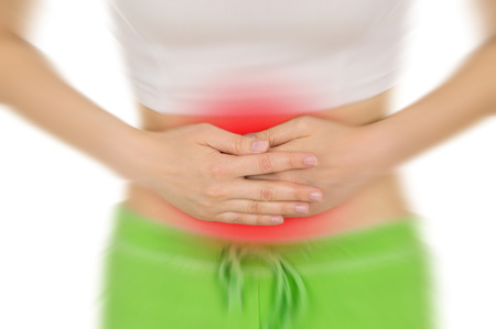 sore belly, shown red, isolated on white backgroundの写真素材